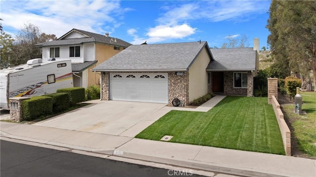 view of front of property with a garage, roof with shingles, concrete driveway, and a front yard