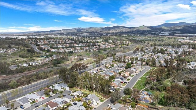 bird's eye view with a residential view and a mountain view