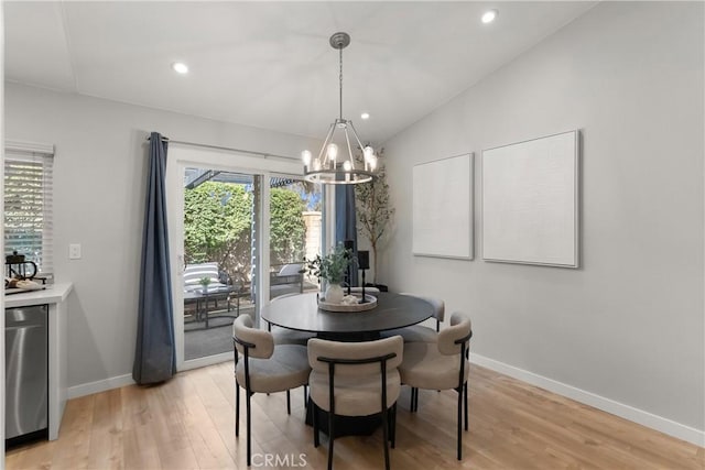 dining area featuring light wood-style floors, baseboards, vaulted ceiling, and recessed lighting