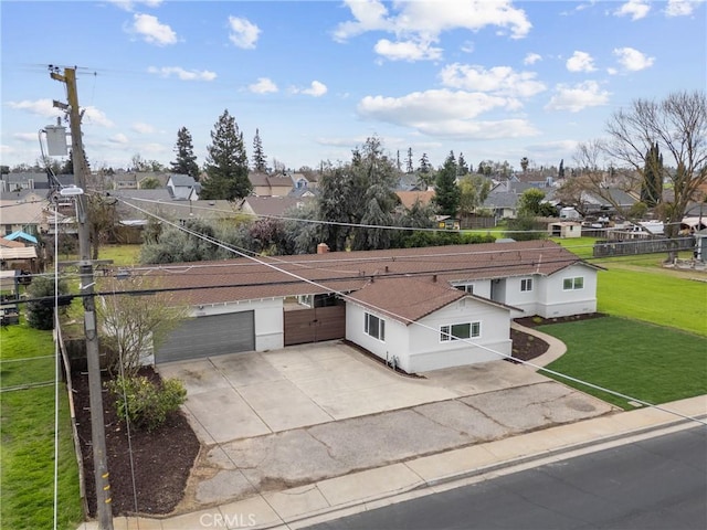 birds eye view of property with a residential view