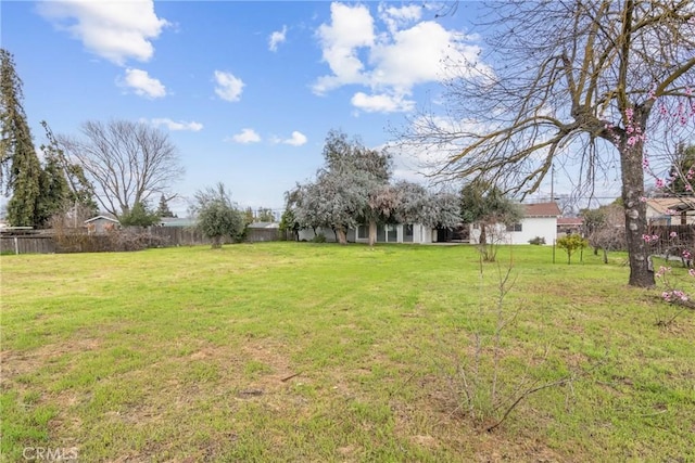 view of yard featuring fence