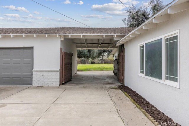 garage featuring driveway