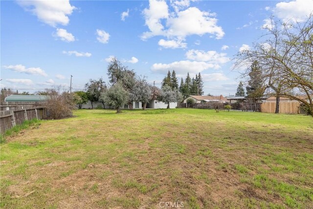 view of yard featuring fence