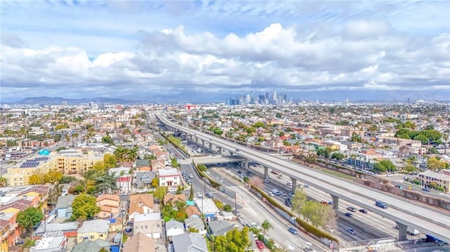 birds eye view of property with a view of city