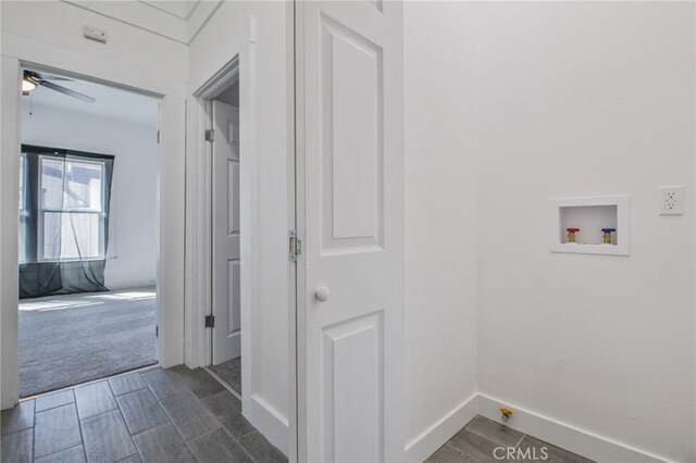 washroom with wood finish floors, hookup for a washing machine, a ceiling fan, and baseboards