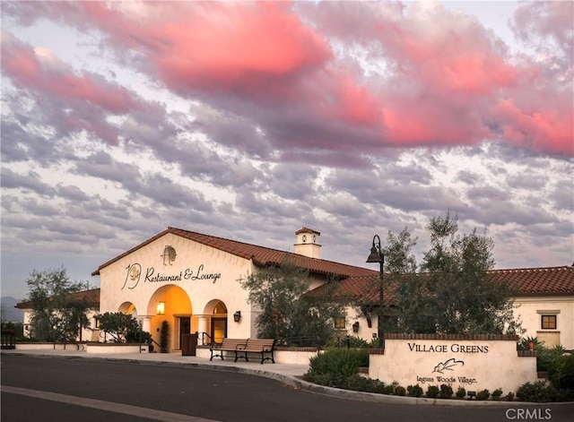 view of property at dusk