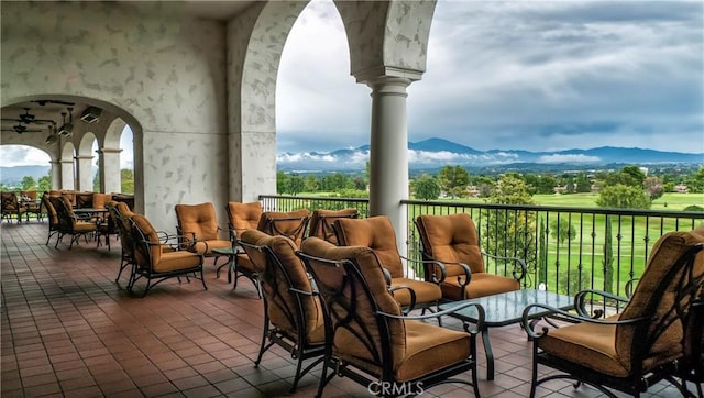 exterior space featuring a mountain view and outdoor lounge area