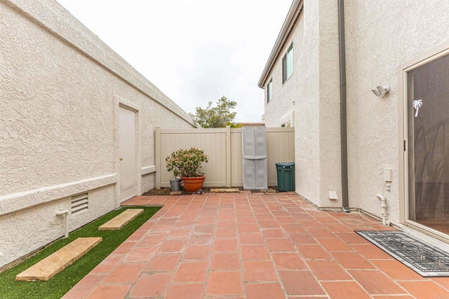 view of patio with fence