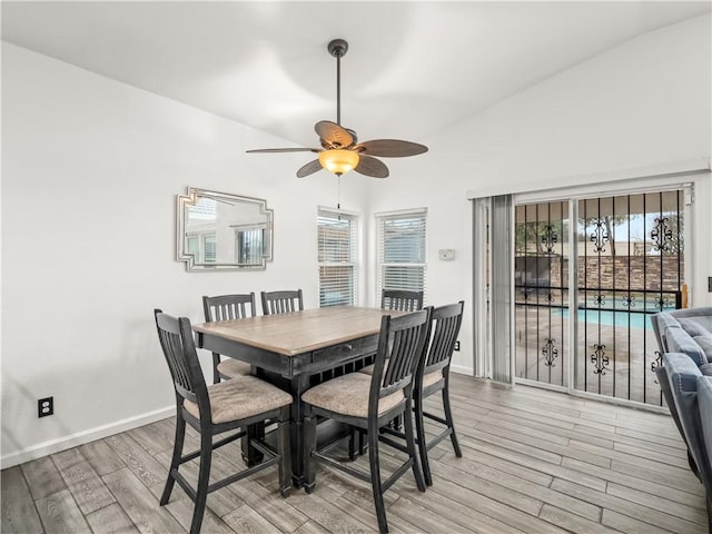 dining space with plenty of natural light, ceiling fan, light wood-type flooring, and baseboards