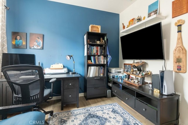 office space featuring light wood-style floors