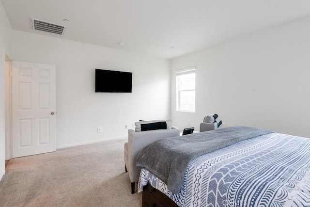 carpeted bedroom with visible vents