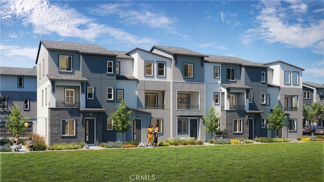 multi unit property featuring stucco siding, a residential view, and a front yard