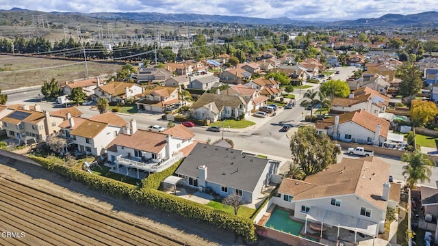 birds eye view of property featuring a residential view and a mountain view