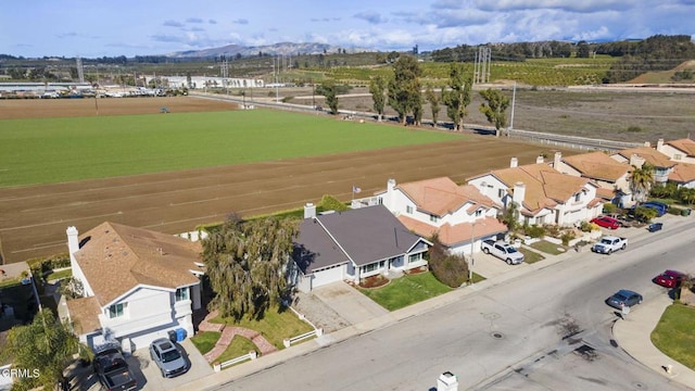 bird's eye view with a rural view and a mountain view