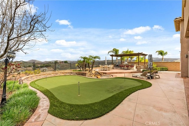 view of community with a patio, a fenced backyard, and a pergola