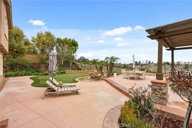 view of patio featuring a fenced backyard and outdoor dining space