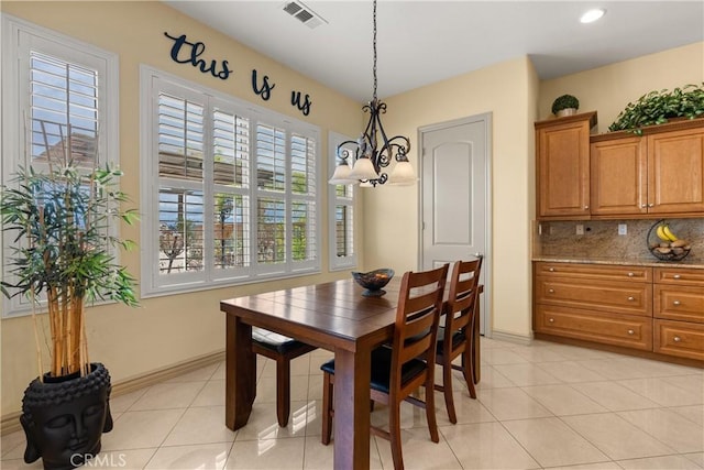 8072 Soft Winds Dr, Corona, CA 92883 - dining room with a chandelier, light tile patterned floors, and recessed lighting