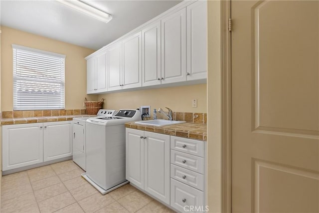 8072 Soft Winds Dr, Corona, CA 92883 - washroom with cabinet space, independent washer and dryer, and light tile patterned floors