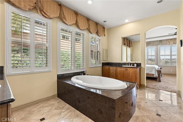 8072 Soft Winds Dr, Corona, CA 92883 - bathroom with a garden tub, vanity, recessed lighting, tile patterned flooring, and connected bathroom