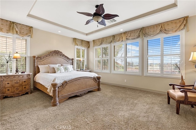 8072 Soft Winds Dr, Corona, CA 92883 - bedroom featuring a raised ceiling, multiple windows, carpet flooring, and ceiling fan