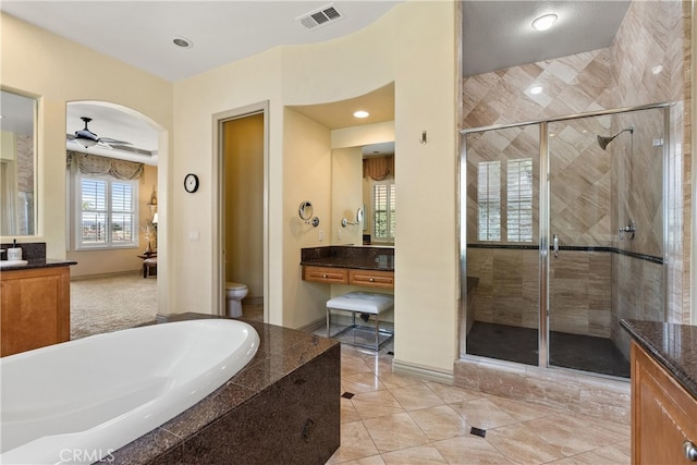 8072 Soft Winds Dr, Corona, CA 92883 - full bath featuring vanity, a stall shower, and a garden tub