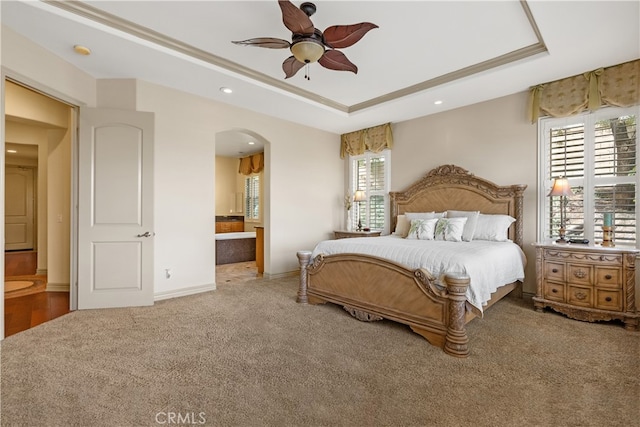 8072 Soft Winds Dr, Corona, CA 92883 - bedroom with carpet flooring, a raised ceiling, arched walkways, recessed lighting, and ensuite bathroom
