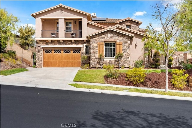 8072 Soft Winds Dr, Corona, CA 92883 - view of front of house featuring stone siding, stucco siding, a tiled roof, solar panels, and concrete driveway