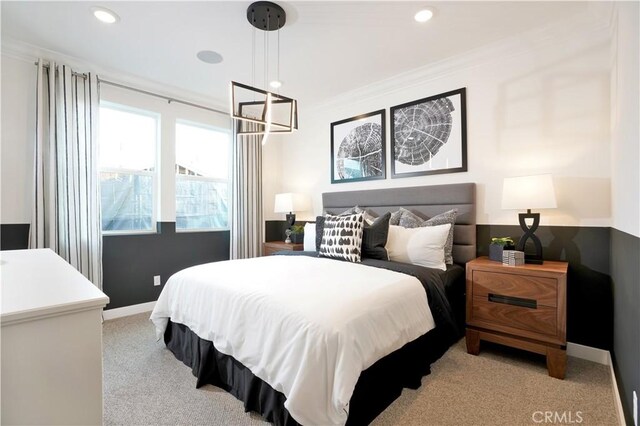 bedroom featuring recessed lighting, light colored carpet, crown molding, and baseboards