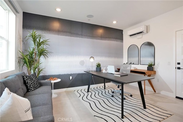 office space with baseboards, an AC wall unit, and recessed lighting