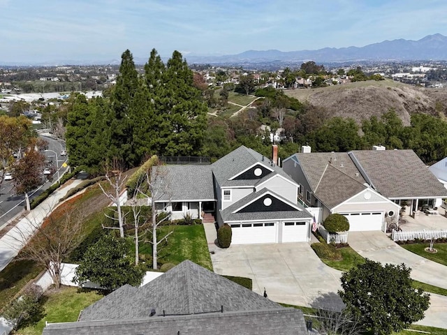 drone / aerial view featuring a mountain view