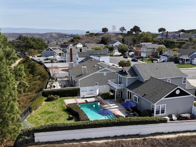 drone / aerial view with a mountain view and a residential view