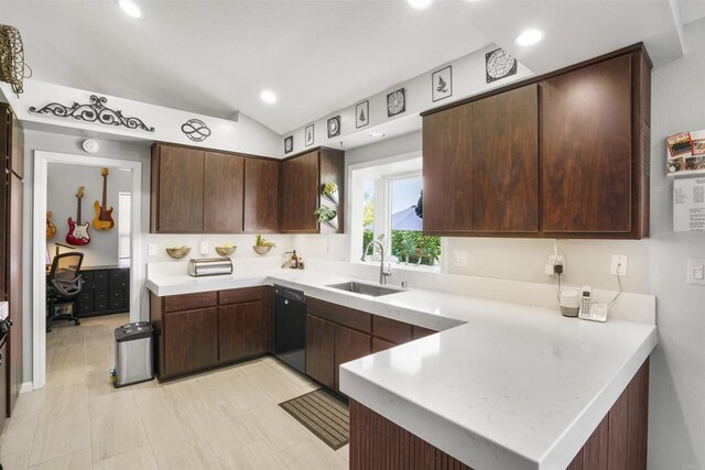 kitchen with a peninsula, a sink, vaulted ceiling, light countertops, and dishwasher