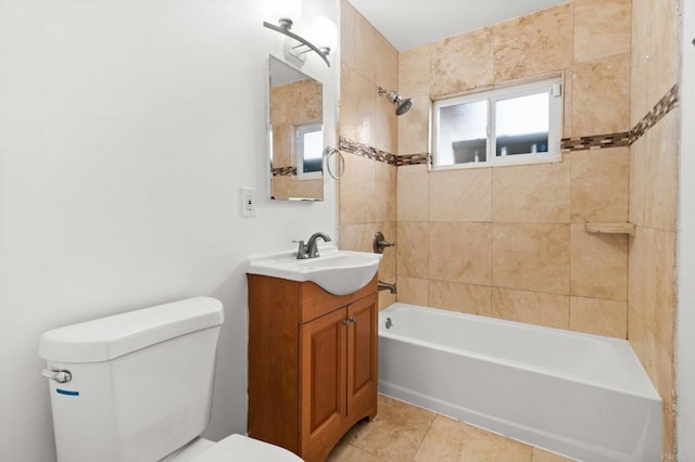 bathroom featuring tile patterned floors, vanity, toilet, and bathing tub / shower combination