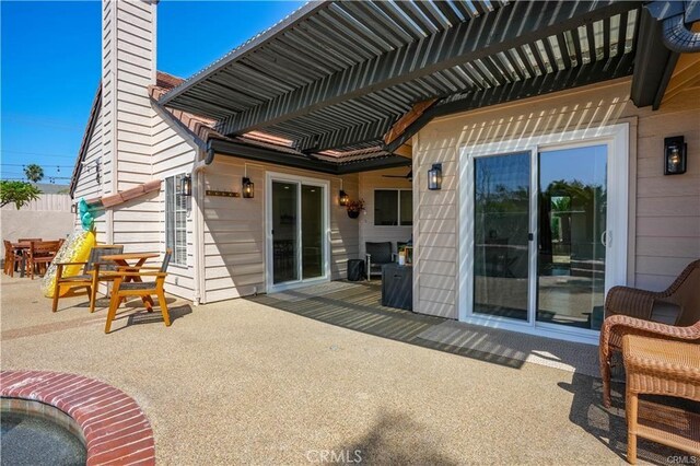 view of patio featuring a pergola