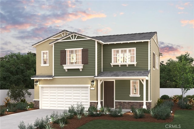 craftsman house featuring driveway, stone siding, an attached garage, and fence