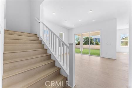 123 Bosal, Irvine, CA 92618 - stairs with plenty of natural light and wood finished floors