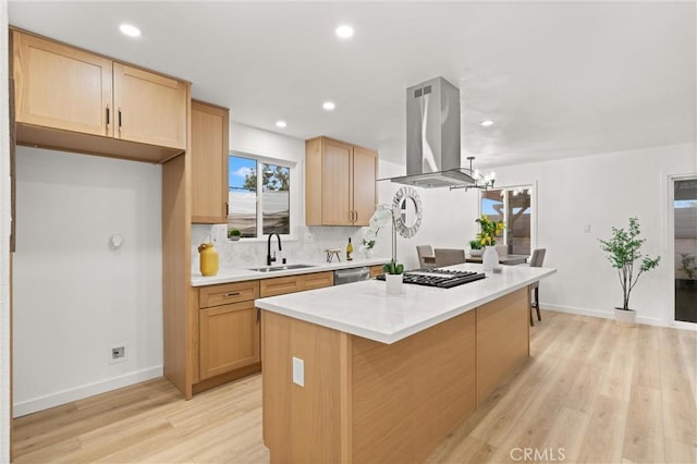 kitchen featuring a sink, stainless steel dishwasher, backsplash, a center island, and island exhaust hood