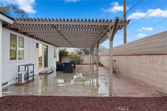 view of patio / terrace with a fenced backyard and a pergola