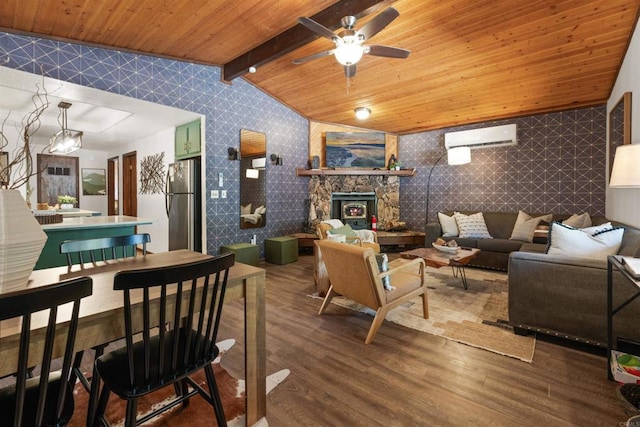 living area featuring lofted ceiling with beams, a wall mounted AC, wood ceiling, wood finished floors, and wallpapered walls