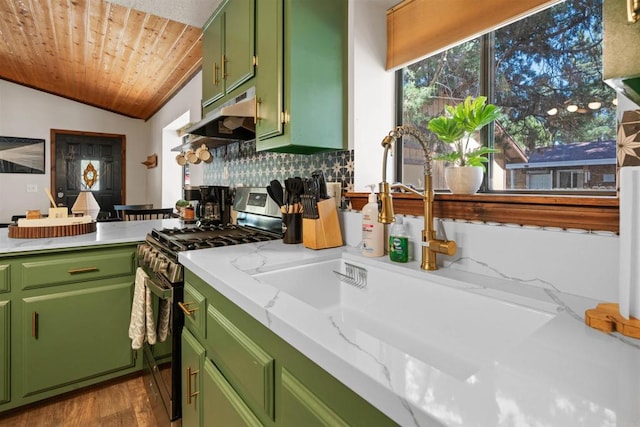 kitchen featuring vaulted ceiling, gas range, wooden ceiling, green cabinetry, and under cabinet range hood