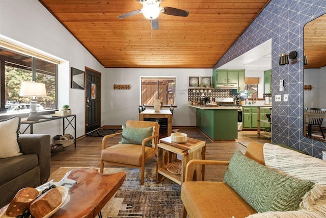 living room featuring lofted ceiling, wood ceiling, baseboards, and wood finished floors