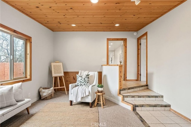 sitting room featuring recessed lighting, wood ceiling, and tile patterned floors