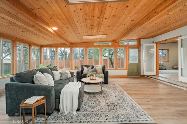 sunroom with a wealth of natural light and wooden ceiling