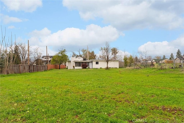 view of yard with fence