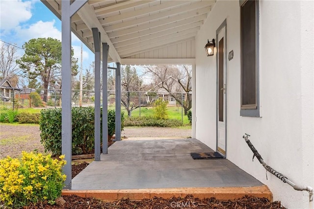 view of patio with fence