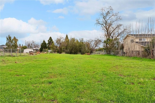 view of yard featuring fence