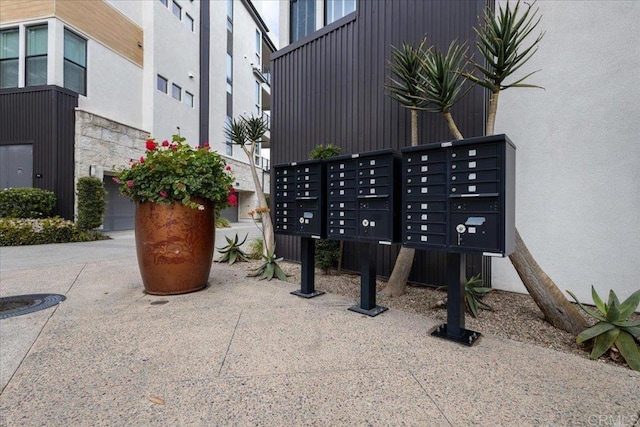 view of home's community with mail area