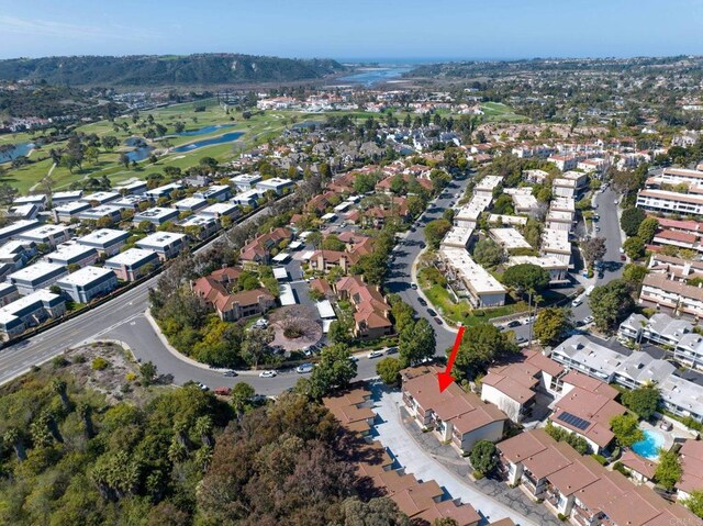 birds eye view of property with a residential view