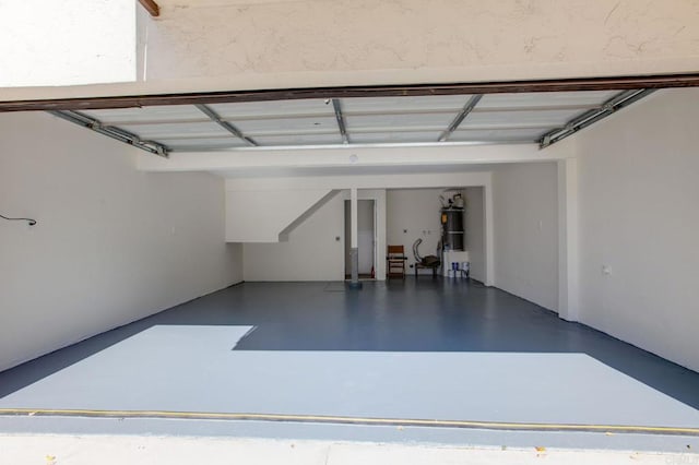 garage featuring strapped water heater