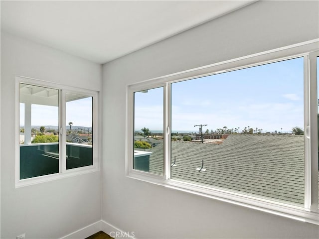 empty room with baseboards